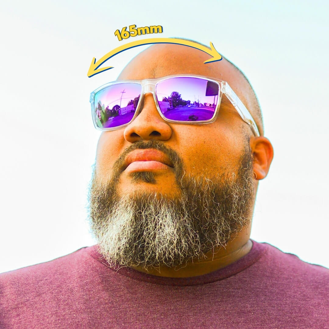 Bald man wearing the best sunglasses for bald men—Faded Days 165mm sunglasses for big heads, featuring mirrored lenses and an extra-wide fit.